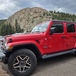 Routes Car Rental - Red Jeep Wrangler