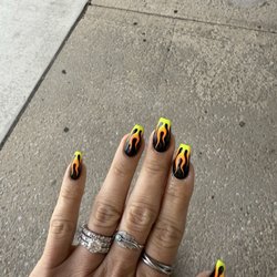 The Best Nail Salon - Acrylic refill with gel polish, a design and coffin shaped.