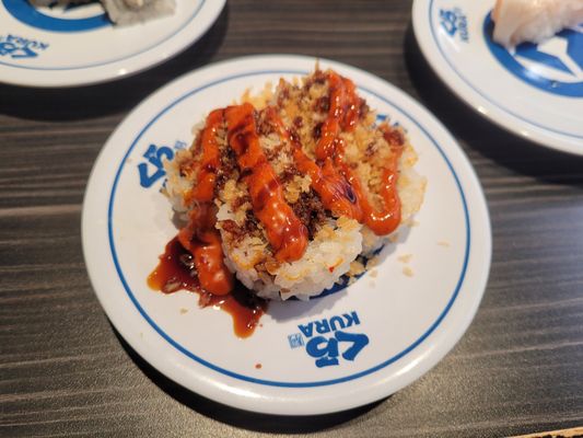 Kura Revolving Sushi Bar by null