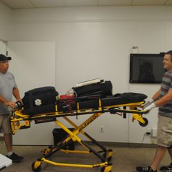 PERCOMOnline - Steven Hobbs, EMT Coordinator and Skills Instructor, works with a student on stretcher operations.