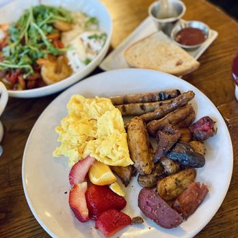 Scarlett Begonia - Two Eggs: Beeler pork sausage links, grained potatoes, fruits, sourdough toast - Breakfast & Brunch Near Me - Santa Barbara, California