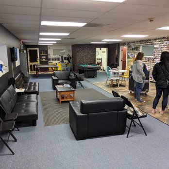 Escape The Space - Inside the staging/waiting area. It has games you can play while you wait. Pool, ping pong, puzzles, and more. - Escape Games Near Me - Athens, Georgia