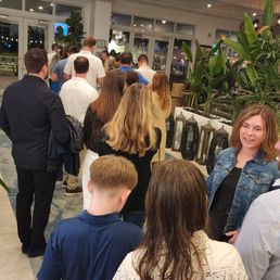 Waiting in line,  then cafeteria seating.