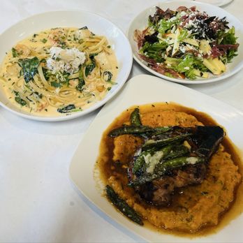 Paradiso Restaurant - Double Cut Molasses Brined Duroc Pork Chop, Seafood Fettuccine, and Apple & Prosciutto Salad - Italian Near Me - San Leandro, California Paradiso Restaurant - Double Cut Molasses Brined Duroc Pork Chop, Seafood Fettuccine, and Apple & Prosciutto Salad - Italian Near Me - San Leandro, California