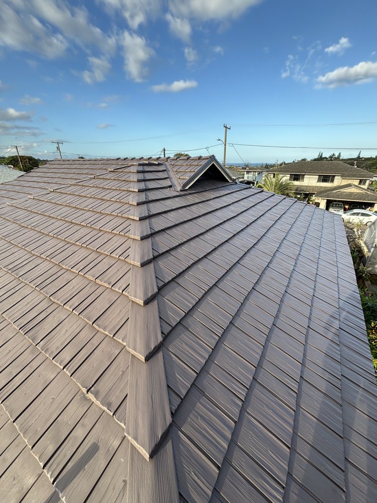 Slide of Valley Isle Roofing