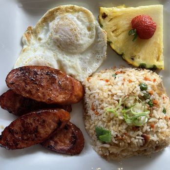 Moena Café - MC Breakfast with Portuguese sausage, over easy eggs, fried rice with pineapple + strawberry - Cafes Near Me - Honolulu, Hawaii Moena Café - MC Breakfast with Portuguese sausage, over easy eggs, fried rice with pineapple + strawberry - Cafes Near Me - Honolulu, Hawaii
