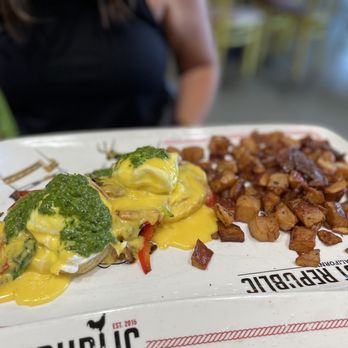 Breakfast Republic - She loved her pesto eggs Benedict - Breakfast & Brunch Near Me - Irvine, California Breakfast Republic - She loved her pesto eggs Benedict - Breakfast & Brunch Near Me - Irvine, California