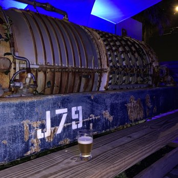 Skunkworts Brewing Concern - A genuine General Electric J79 jet engine seating bench! - Breweries Near Me - West Palm Beach, Florida Skunkworts Brewing Concern - A genuine General Electric J79 jet engine seating bench! - Breweries Near Me - West Palm Beach, Florida