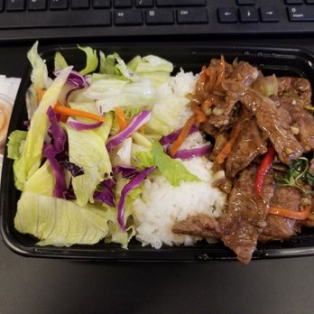 Street Cook - Thai Basil Steak with White Rice - Steakhouses Near Me - New York, New York Street Cook - Thai Basil Steak with White Rice - Steakhouses Near Me - New York, New York