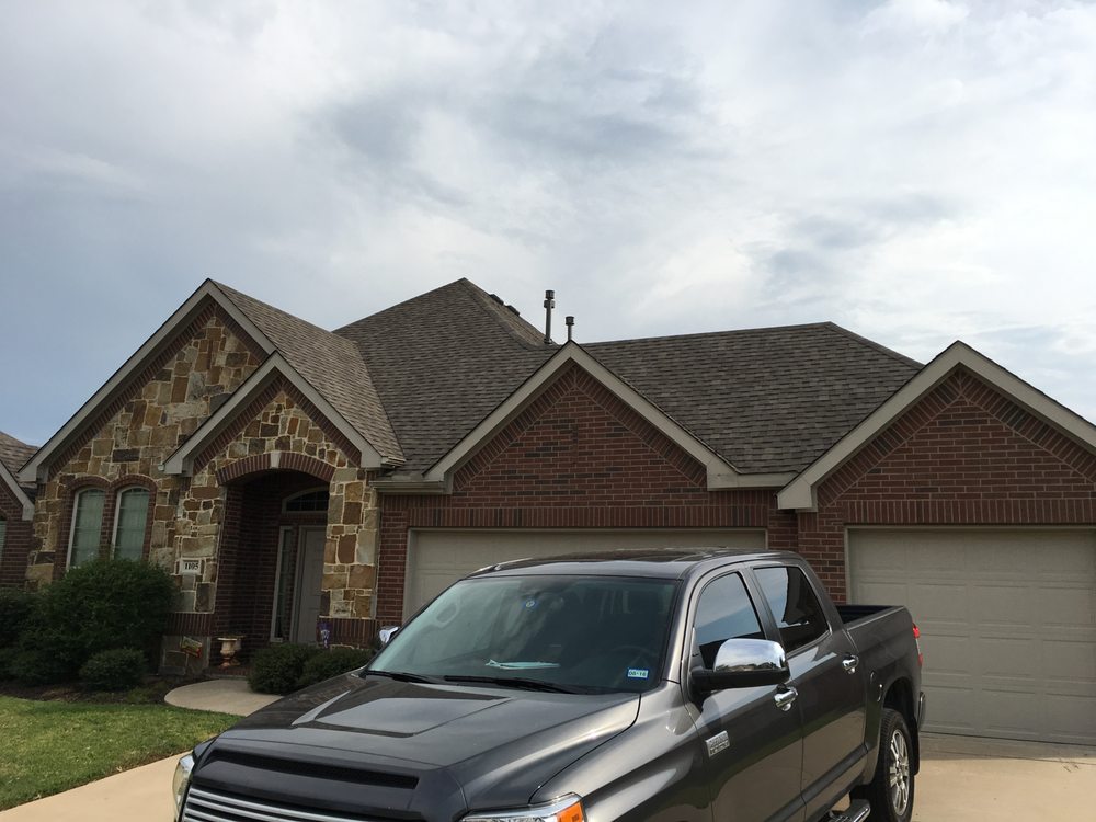 Slide of Greyhawk Roofing