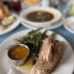 High Hat Cafe - Slow roasted port, Pimento Cheese Grits, High Hat Boudin Chicken & Andouille Gumbo Ya-Ya Bowl.