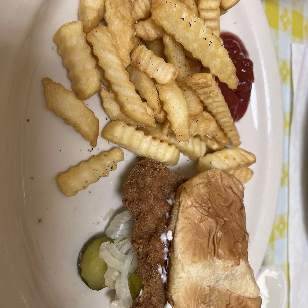 The Toast Cafe - Breaded pork tenderloin Indiana style, just the way I love them! Delicious! - Cafes Near Me - Fruitland Park, Florida