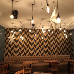 Café Lumière - Modern friendly interior with personal family history.