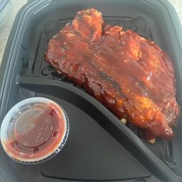 Half slab of ribs with sauce Half slab of ribs with sauce