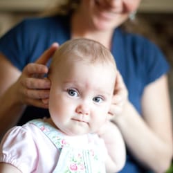 Awaken Chiropractic - Adjusting baby Betsy