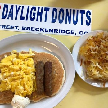 Daylight Donuts - This is the Daylight Special $6.50.. 2 eggs, 2 sausage, and a delicious pancake. Also ordered a side of hashbrowns. - Donuts Near Me - Breckenridge, Colorado