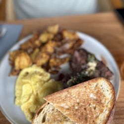 Steak and eggs with the house potatoes