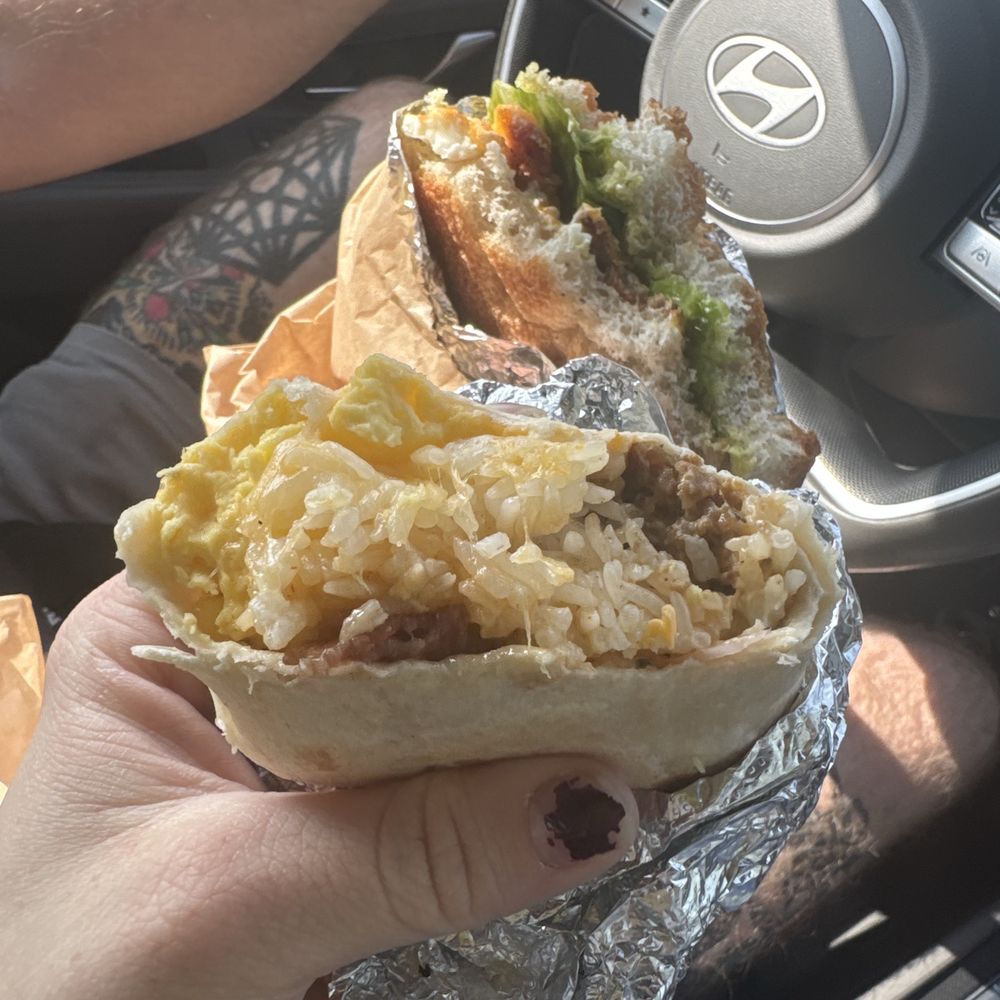 the truth burrito and classic sandwich on focaccia. the truth burrito and classic sandwich on focaccia.