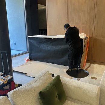 NY Couch Surgeon - Fabio starting to disassemble the couch - Furniture Assembly Near Me NY Couch Surgeon - Fabio starting to disassemble the couch - Furniture Assembly Near Me