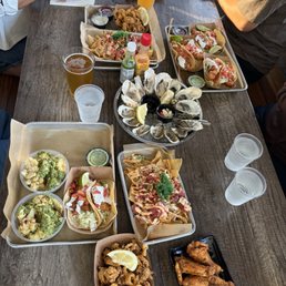 Cauliflower, shrimp tempura, calamari, fish tacos, chicken wings, fresh oysters, fried oysters, poke nachos Cauliflower, shrimp tempura, calamari, fish tacos, chicken wings, fresh oysters, fried oysters, poke nachos