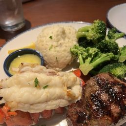 Steak and lobster w/broccoli and mashed potatoes. Steak and lobster w/broccoli and mashed potatoes.