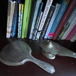 Frank Wright Glass - Restored with accurate patination for period piece hand mirror. Wonderful to have our heirloom so carefully handled!