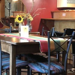 Mistiso's Place Vacation Rentals - The dining room adjoining the kitchen embraces an open design concept, creating a seamless and inviting space for gathering.