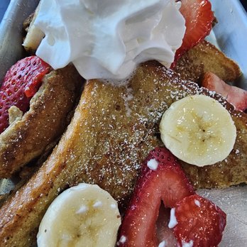 Thanks A Brunch - Gilbert - CLASSIC French toast - French toast served with sliced strawberries, bananas, whipped cream, and a dusting of powdered sugar. - Burgers Near Me - Gilbert, Arizona