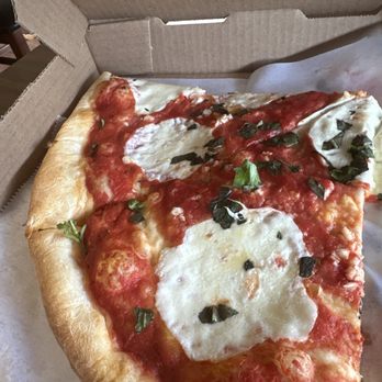 Pavarotti's Pizza & Restaurant - Two slices of the pizza - Pizza Near Me - Dunnellon, Florida Pavarotti's Pizza & Restaurant - Two slices of the pizza - Pizza Near Me - Dunnellon, Florida