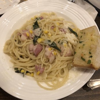 The Queensboro - Spaghetti with bacon and one piece of the garlic clam bread. - Gastropubs Near Me - Jackson Heights, New York The Queensboro - Spaghetti with bacon and one piece of the garlic clam bread. - Gastropubs Near Me - Jackson Heights, New York