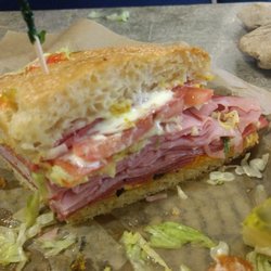 Schlotzsky's - 1/4 of The original I suggest getting a smaller size packed with meat, olive spread and veggies.