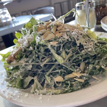 Supino Pizzeria - Back for more of this AMAZING salad - Rucola Salad with labne dressing, parmigiano reggiano, almonds - Pizza Near Me - Detroit, Michigan Supino Pizzeria - Back for more of this AMAZING salad - Rucola Salad with labne dressing, parmigiano reggiano, almonds - Pizza Near Me - Detroit, Michigan