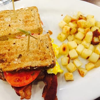 First Watch - Bacon, Egg, Cheese with Tomato and Mayo on Toast with Roasted Potatoes. - American Near Me - Laurel, Maryland