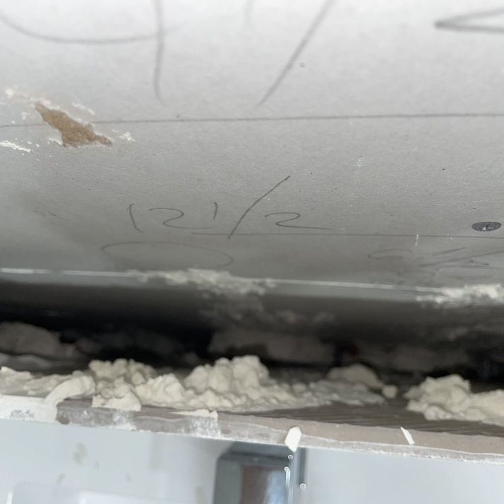 Tap Remodeling - Behind the vanity. Vanity is supported to the tile and the tiles supported to the wall with just material. - Painters Near Me Tap Remodeling - Behind the vanity. Vanity is supported to the tile and the tiles supported to the wall with just material. - Painters Near Me