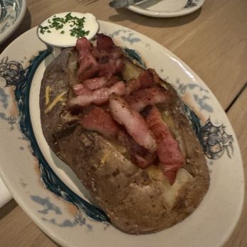 Peter Luger Steak House - Loaded baked potato- huge! - Steakhouses Near Me - Las Vegas, Nevada Peter Luger Steak House - Loaded baked potato- huge! - Steakhouses Near Me - Las Vegas, Nevada
