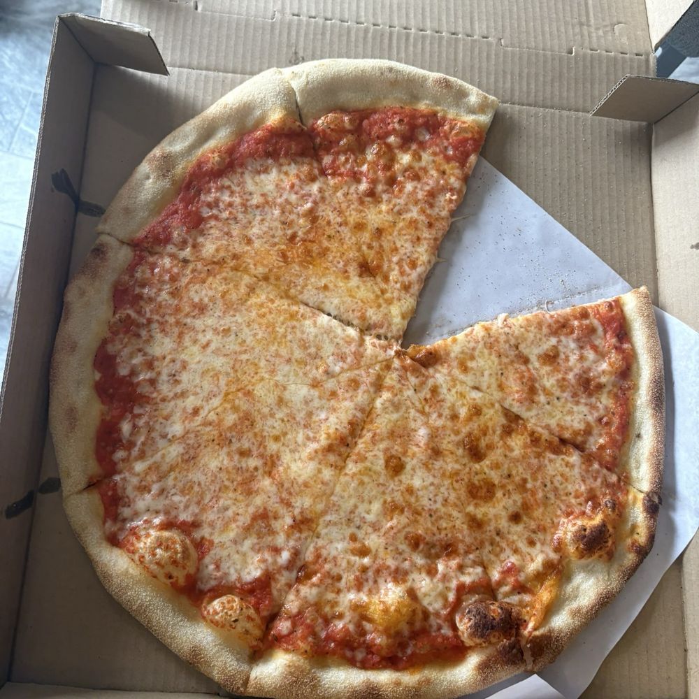 Pomodoro Pizzeria - Cheese Pizza (oops... the camera didn't eat first) - Pizza Near Me - Bethany Beach, Delaware Pomodoro Pizzeria - Cheese Pizza (oops... the camera didn't eat first) - Pizza Near Me - Bethany Beach, Delaware