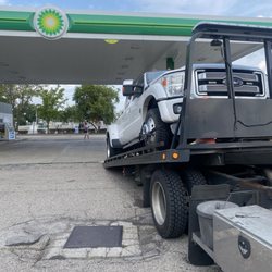 Wren's Service Station - Big boy getting towed.