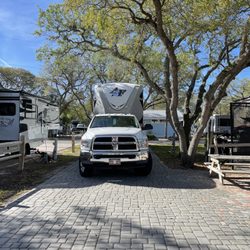 Ocean Grove RV resort - Look at the tree branches, proximity and shared space on the pad. Poor design.