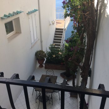Hotel Villa Franca - The view of other guests patio from our balcony. - Hotels Near Me - Positano, SA Hotel Villa Franca - The view of other guests patio from our balcony. - Hotels Near Me - Positano, SA