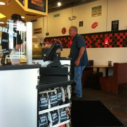 Jimmy John's - Customer ordering at the counter.