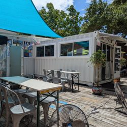 Sarrica’s Little Italy - The view from my preferred table. Sarti will bring out floorstanding fans for guests if it's hot out.