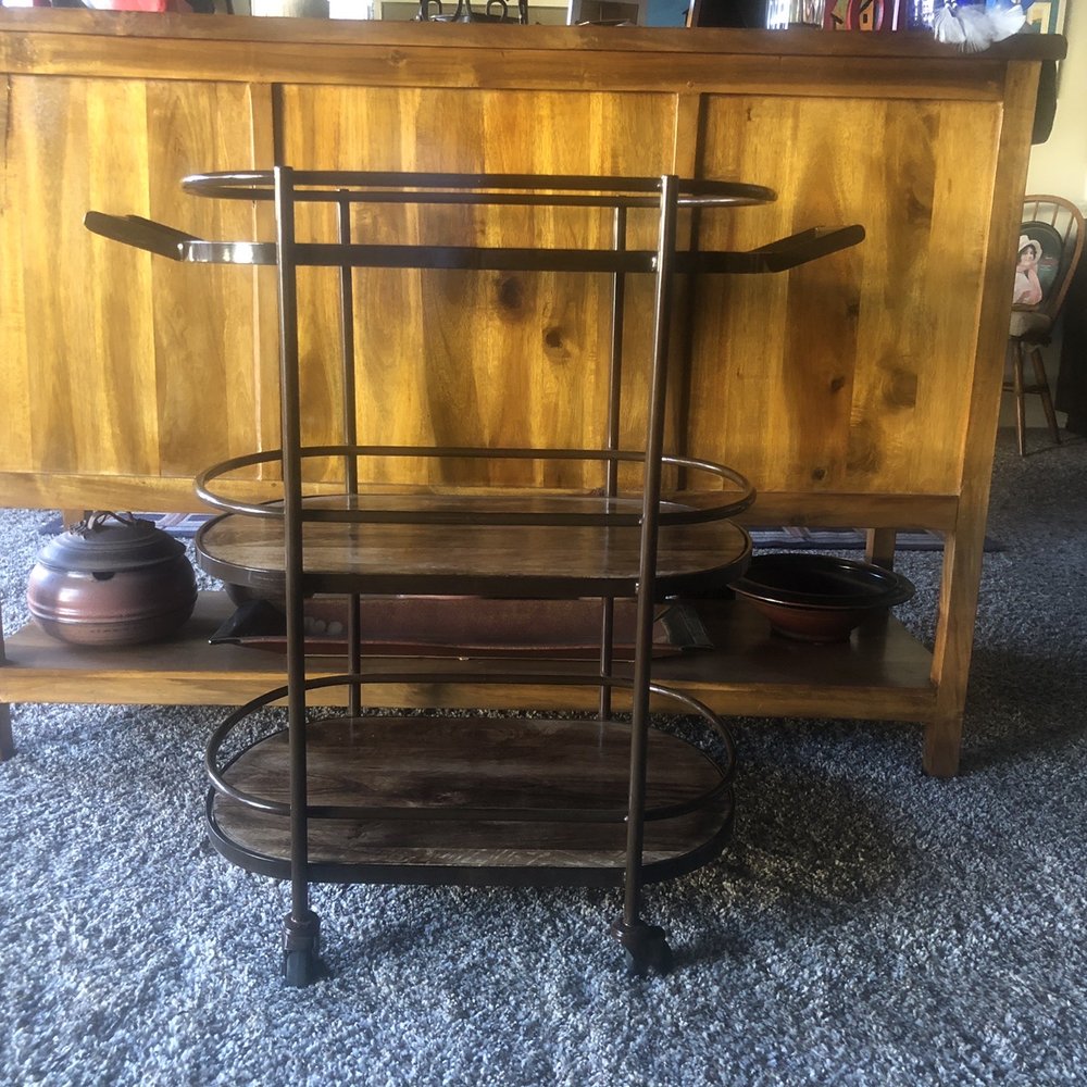This rolling bar cart arrived today from 10,000 villages in Pasadena. This rolling bar cart arrived today from 10,000 villages in Pasadena.