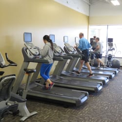 Anytime Fitness - Treadmills, ellipticals, steppers, and bikes all come with individual TV connected to Direct TV.