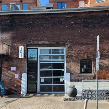 Brodflour - a brick building with a bicycle parked in front of it - Bakeries Near Me - Toronto, Ontario Brodflour - a brick building with a bicycle parked in front of it - Bakeries Near Me - Toronto, Ontario