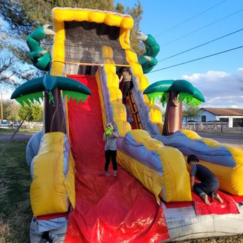 2gether We Bounce - 21 ft dinosaur slide!! - Bounce House Rentals Near Me