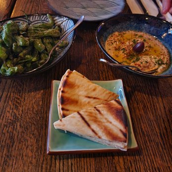 Dunya Bistro - Shishito peppers , hummus & freshly baked pita bread - Mediterranean Near Me - San Francisco, California Dunya Bistro - Shishito peppers , hummus & freshly baked pita bread - Mediterranean Near Me - San Francisco, California