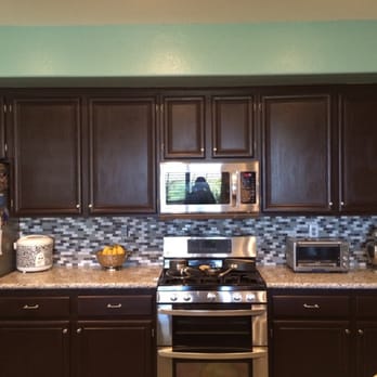 Capital Counters & Cabinets - After- don't mind my reflection. Look at that backsplash! - Flooring Near Me - Corona, California Capital Counters & Cabinets - After- don't mind my reflection. Look at that backsplash! - Flooring Near Me - Corona, California