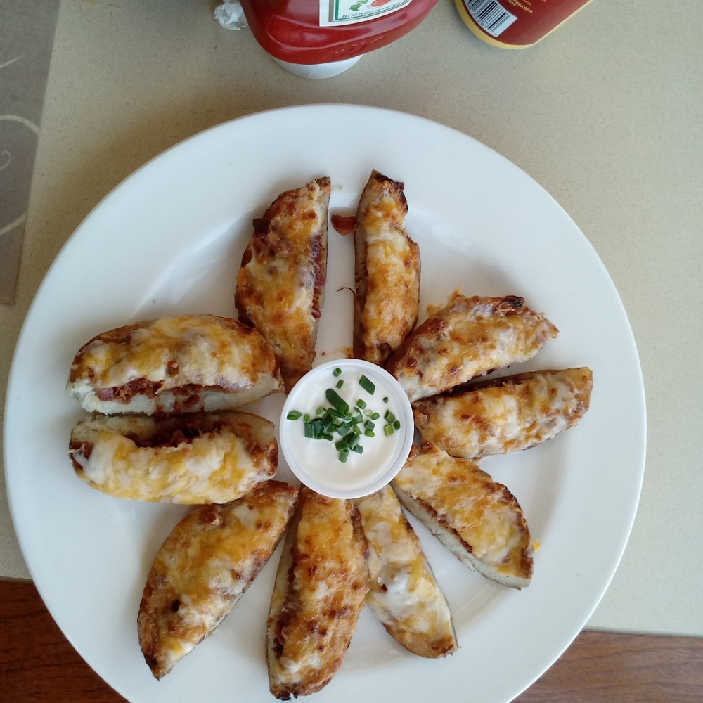 Sage Cafe - Stuffed potato skins appetizer: minced bacon, cheddar cheese, sour cream & chives, $5.95 - American Near Me - Lakeside, California Sage Cafe - Stuffed potato skins appetizer: minced bacon, cheddar cheese, sour cream & chives, $5.95 - American Near Me - Lakeside, California