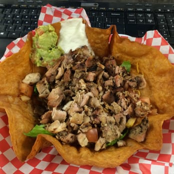 Champs BBQ - Good! But not quite as nice as the other Taco Salad picture on here. Compare that scoop of guac. Seriously! Hehe! Still, not bad - Barbeque Near Me - Bakersfield, California
