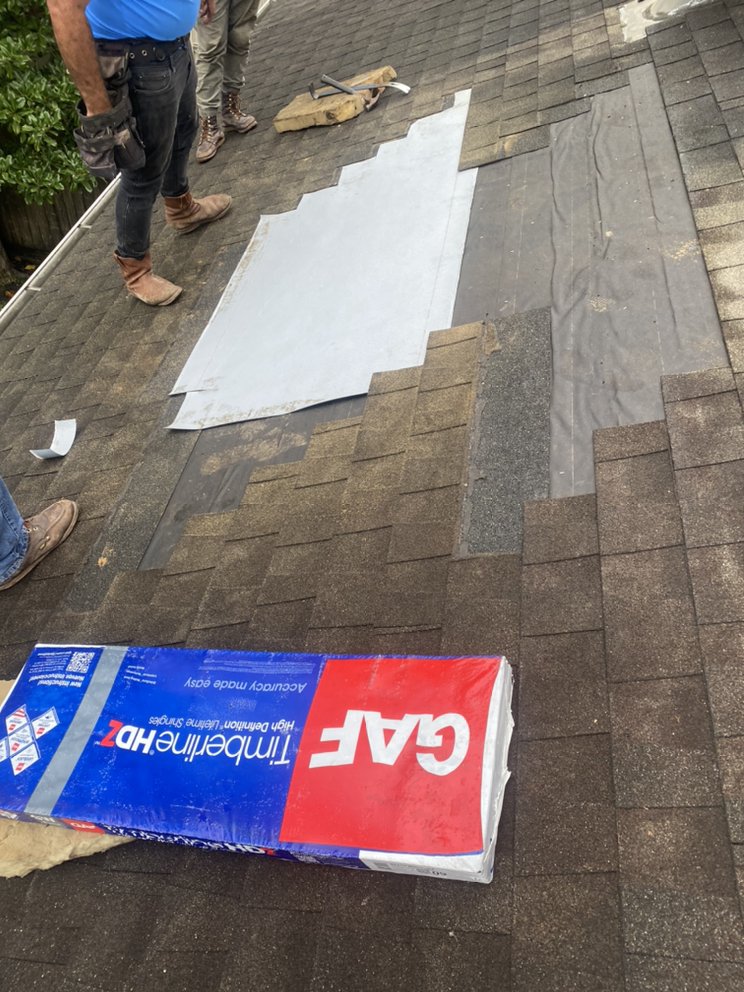 Slide of Coale Roofing